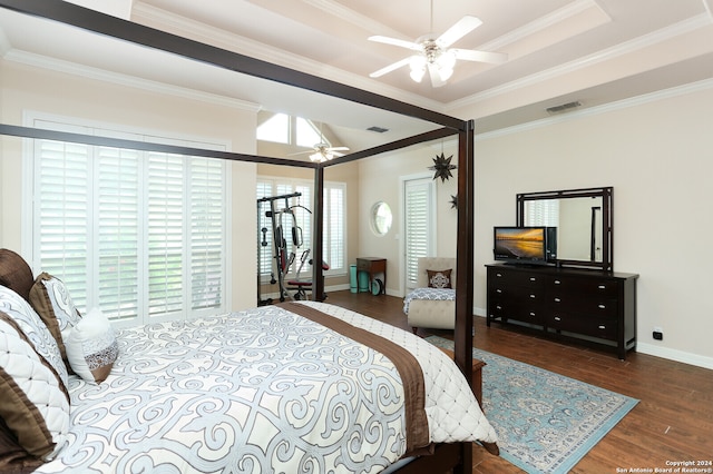 bedroom featuring ceiling fan, ornamental molding, and dark hardwood / wood-style floors