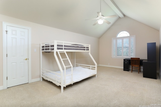 carpeted bedroom featuring ceiling fan and vaulted ceiling with beams