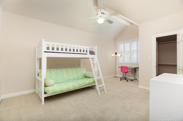 bedroom featuring ceiling fan, carpet flooring, and lofted ceiling with beams