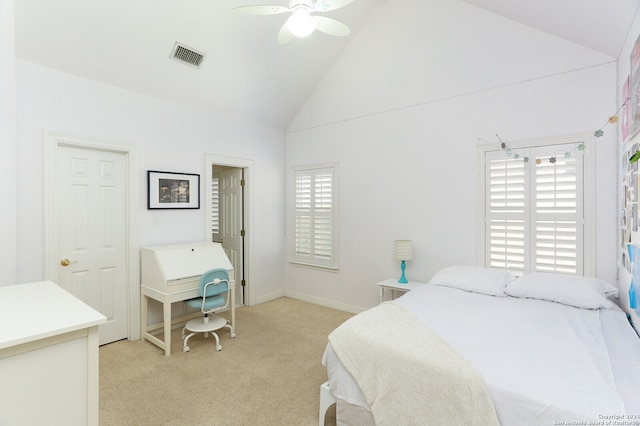 bedroom with ceiling fan, light colored carpet, and high vaulted ceiling