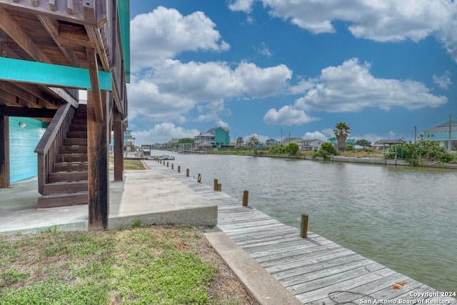 view of dock with a water view