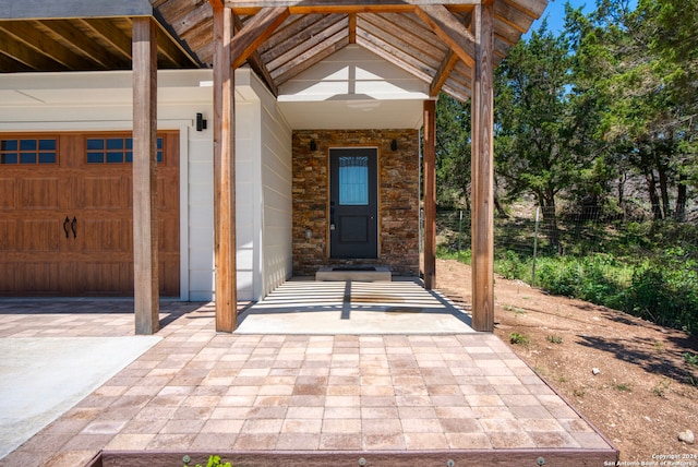 entrance to property featuring a garage