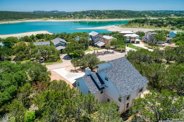 drone / aerial view with a water view