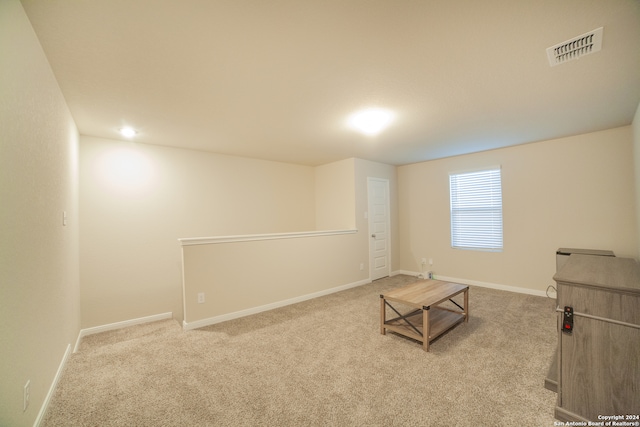 interior space with light colored carpet