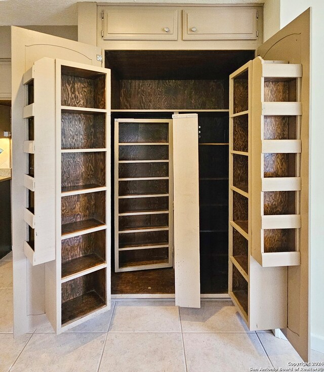 pantry featuring wine cooler