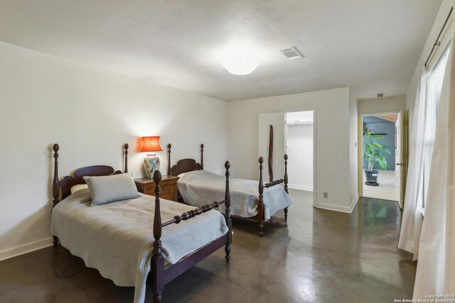 bedroom featuring a spacious closet