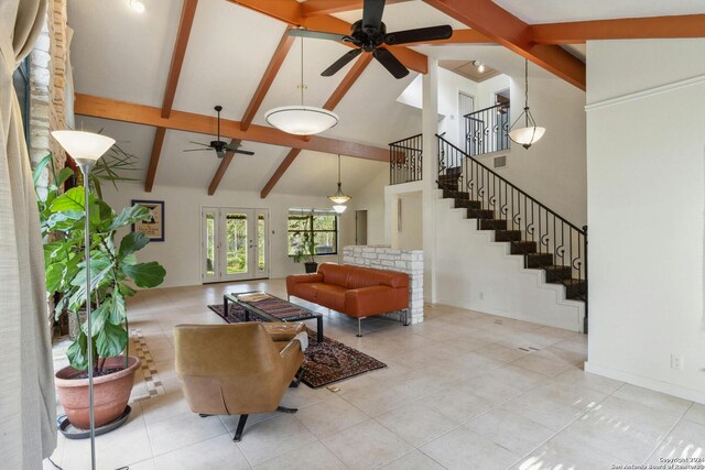 living room with high vaulted ceiling, ceiling fan, beam ceiling, and light tile floors