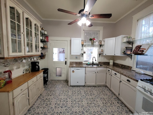 kitchen with light tile flooring, ceiling fan, white cabinetry, sink, and white appliances