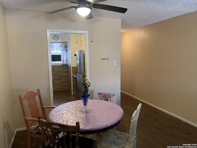 923 Vance Jackson Rd Unit 108A, San Antonio, TX 78201 - dining space with a ceiling fan, a textured ceiling, wood finished floors, and baseboards