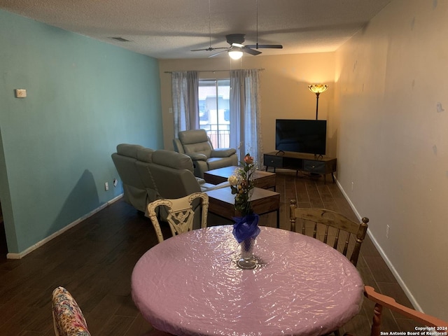923 Vance Jackson Rd Unit 108A, San Antonio, TX 78201 - dining room with ceiling fan, baseboards, wood finished floors, and a textured ceiling