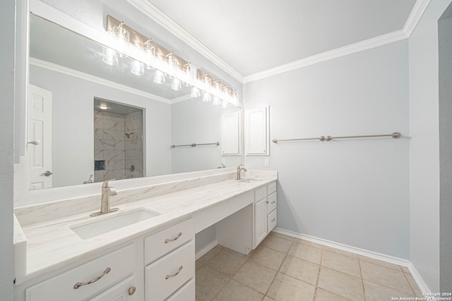 bathroom featuring a tile shower, tile patterned flooring, vanity, and ornamental molding