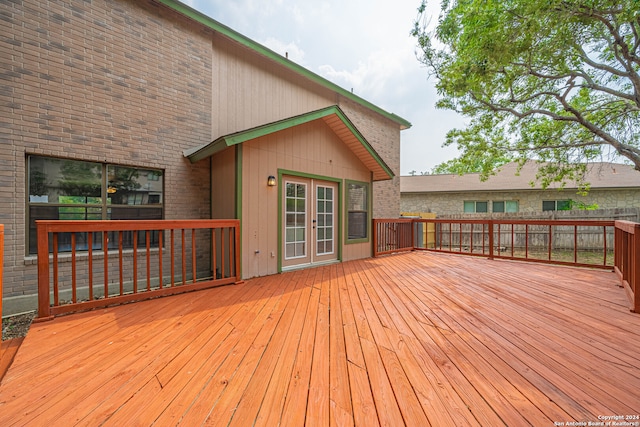 wooden terrace featuring french doors