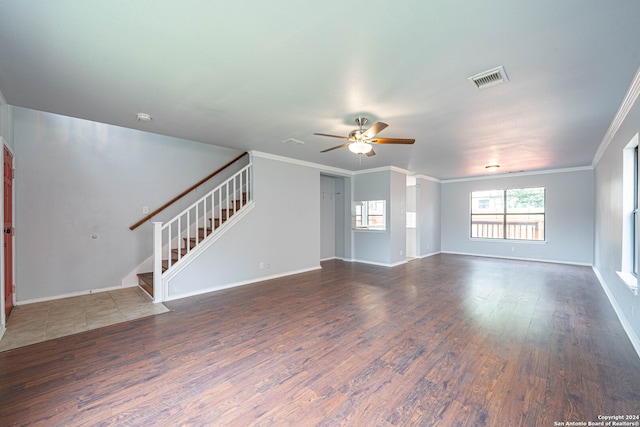 unfurnished living room featuring ceiling fan, dark hardwood / wood-style floors, and ornamental molding