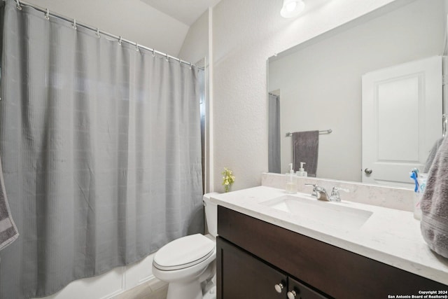 bathroom featuring shower / bath combination with curtain, toilet, and vanity