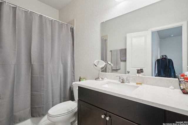 full bath with a shower with shower curtain, toilet, and vanity