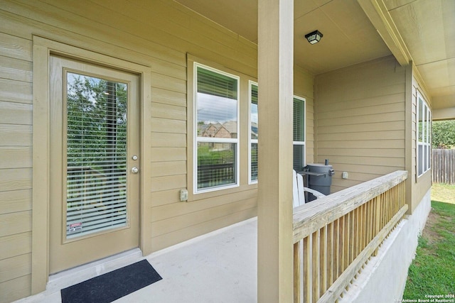 doorway to property featuring a porch