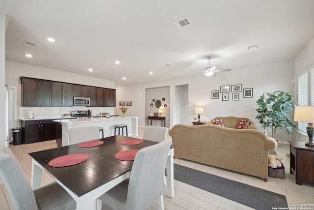 dining room featuring visible vents, recessed lighting, and a ceiling fan