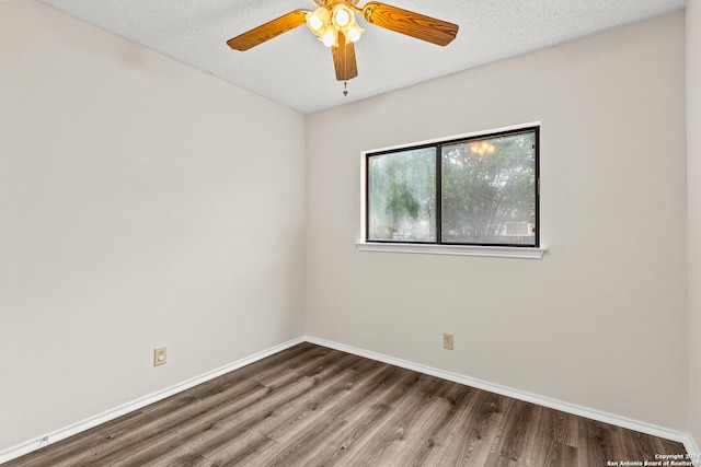 empty room with wood-type flooring, a textured ceiling, and ceiling fan