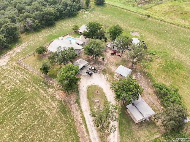 birds eye view of property featuring a rural view