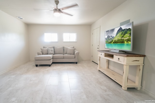 living room with ceiling fan