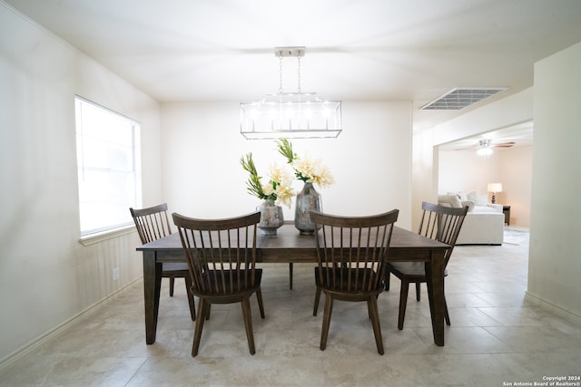 dining room featuring ceiling fan