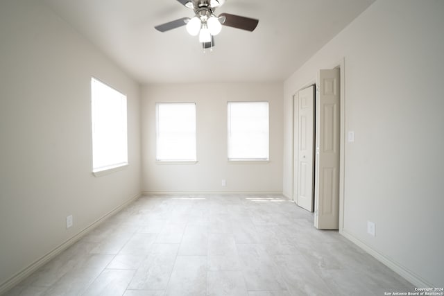 empty room with ceiling fan