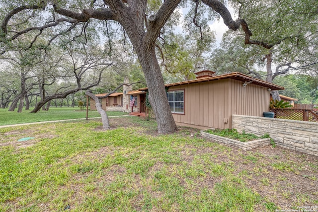 exterior space featuring a front lawn