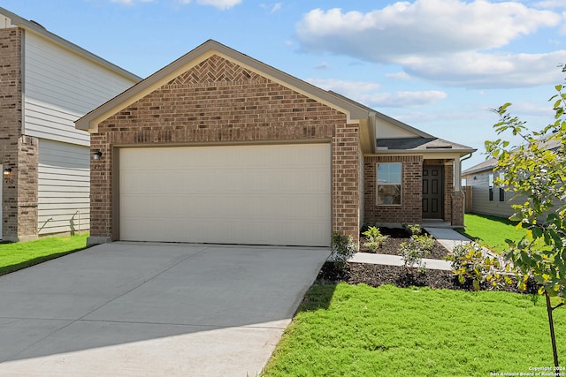 view of front facade with a garage and a front lawn