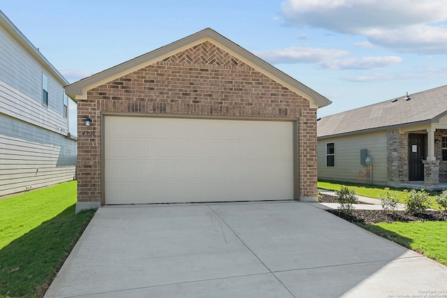 view of front facade featuring a garage and an outdoor structure