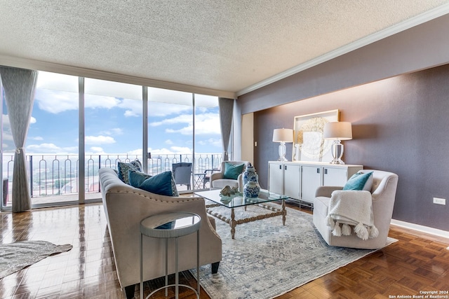 living room with parquet flooring, a textured ceiling, floor to ceiling windows, and crown molding