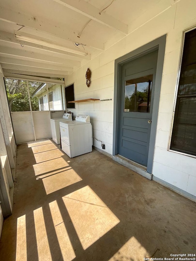 view of patio / terrace with washer and dryer and an outdoor kitchen