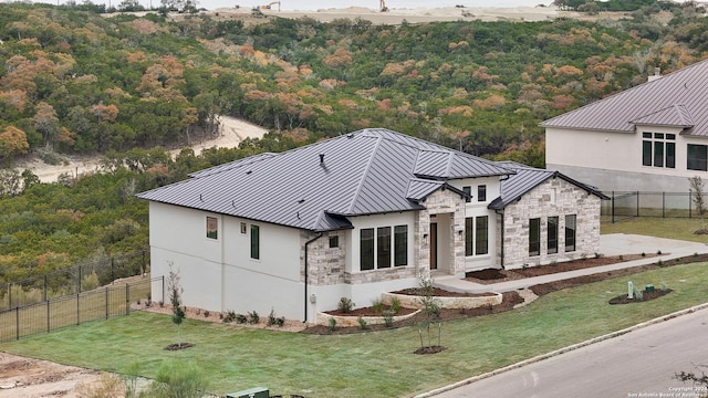 exterior space featuring a front lawn