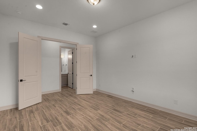 unfurnished bedroom featuring light hardwood / wood-style flooring