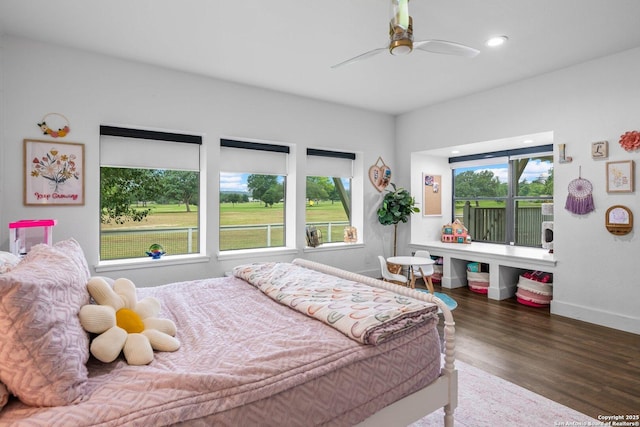 bedroom featuring recessed lighting, ceiling fan, baseboards, and wood finished floors