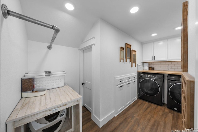 laundry room with independent washer and dryer, dark wood finished floors, cabinet space, and recessed lighting