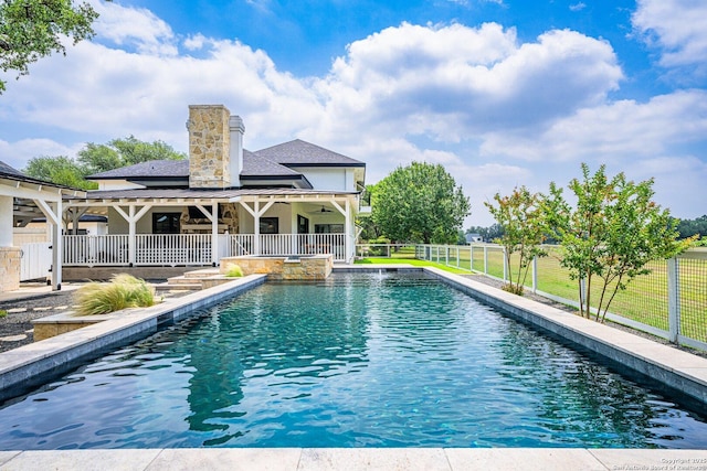 view of pool featuring a fenced in pool, a patio area, and fence