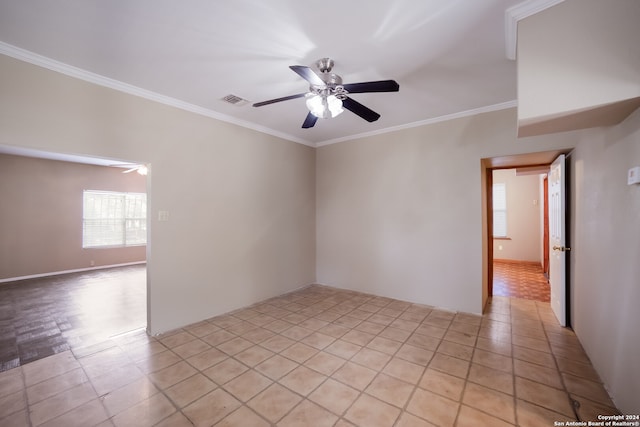 unfurnished room featuring ceiling fan and crown molding