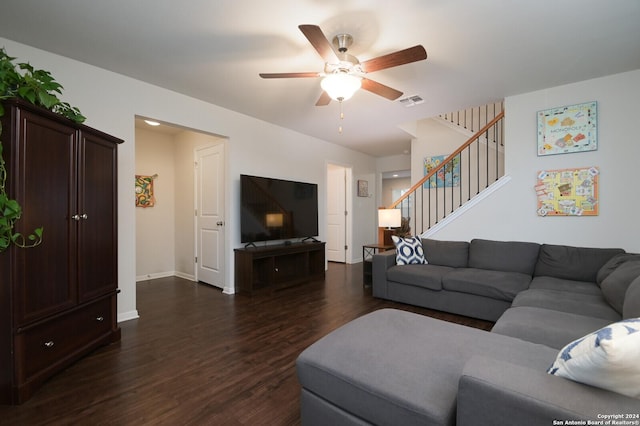 living room with dark hardwood / wood-style floors and ceiling fan