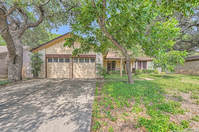 ranch-style home featuring a garage