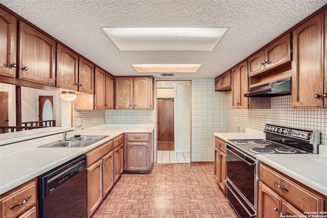 kitchen with electric range oven, light parquet floors, sink, dishwasher, and range hood