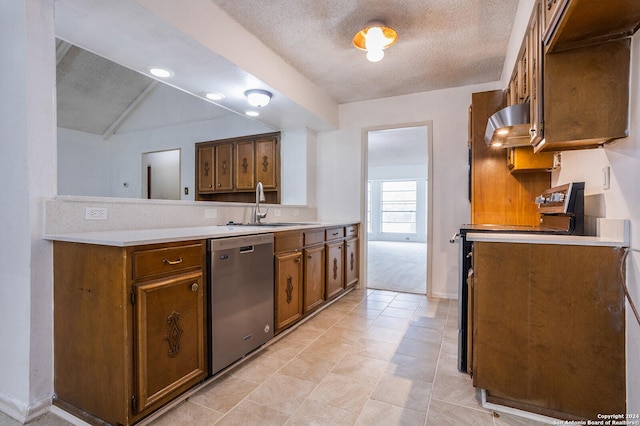 kitchen with range, a textured ceiling, stainless steel dishwasher, and lofted ceiling