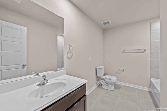 bathroom with tile patterned flooring, visible vents, baseboards, toilet, and vanity