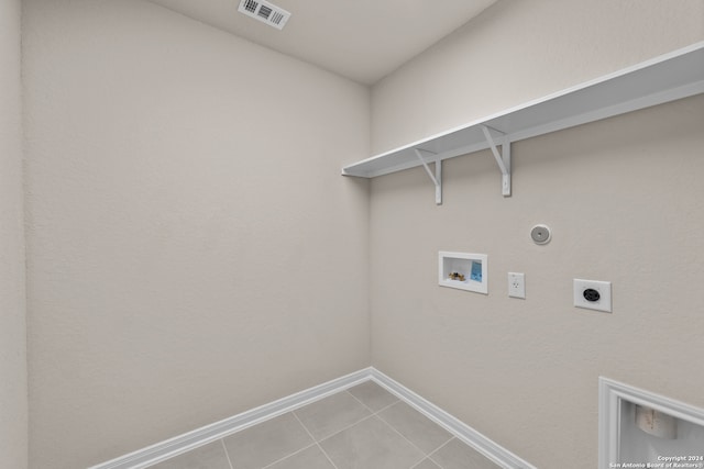 laundry area with hookup for a washing machine, visible vents, gas dryer hookup, hookup for an electric dryer, and laundry area