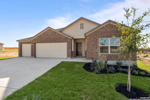 view of front facade with concrete driveway, brick siding, a garage, and a front lawn
