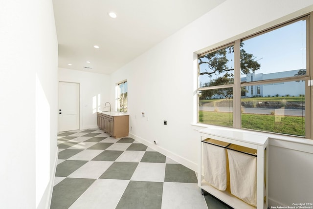 interior space with a water view and a wealth of natural light