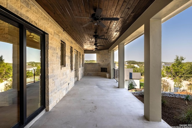 view of patio / terrace featuring ceiling fan