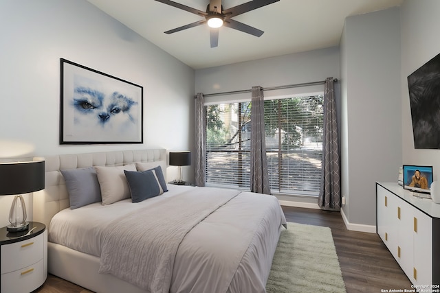 bedroom featuring ceiling fan and dark hardwood / wood-style flooring