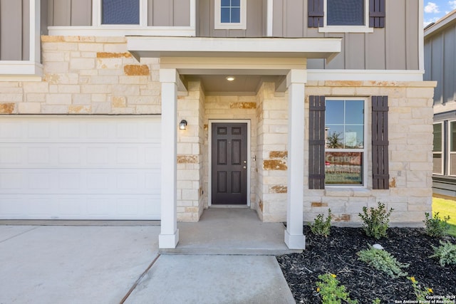 entrance to property with a garage