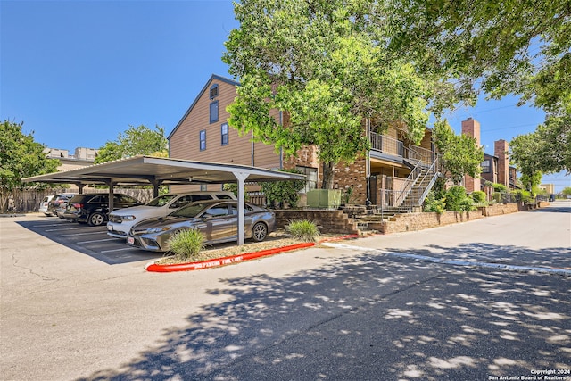 exterior space with a carport