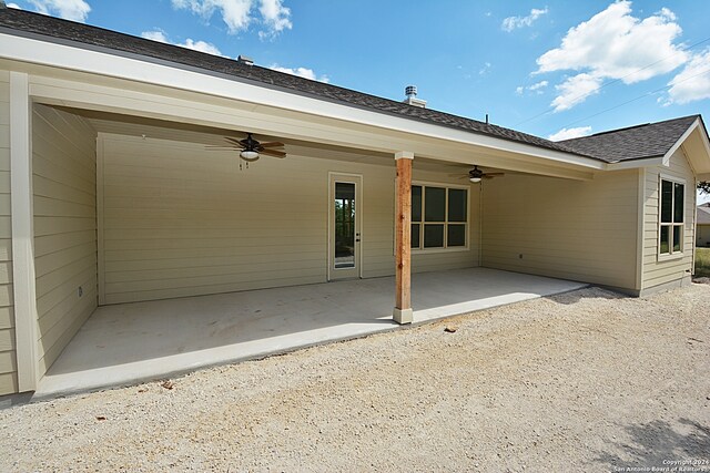 back of house with a patio area and ceiling fan